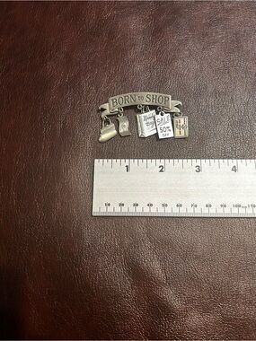 Vintage JJ Jonette Jewelry Born to Shop Silver-Tone Charm Pin